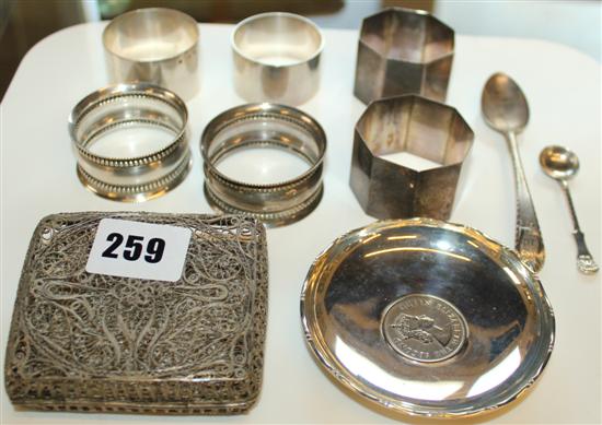 Two pairs of silver serviette rings, 2 others, a silver dish, 2 spoons and silver filigree cigarette case